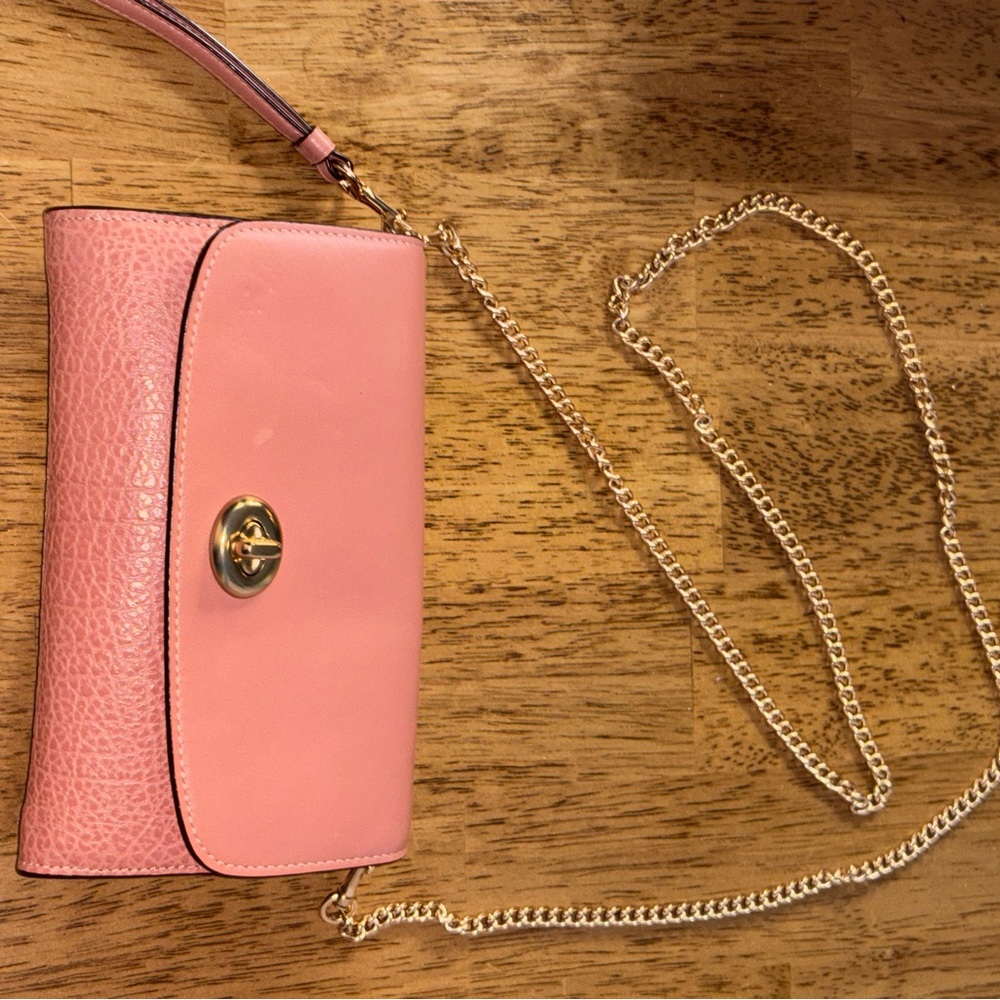 Coach Tilly top leather crossbody/wristlet in melon pink.